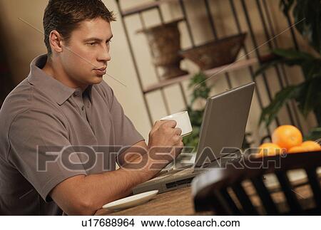 Man working from home View Large Photo Image Picture - Man working from home. Fotosearch
