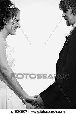 Married couple looks at each other View Large Photo Image Stock Image - Married couple looks at each other. Fotosearch