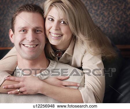 Married couple smiling View Large Photo Image Stock Photo - Married couple smiling. Fotosearch