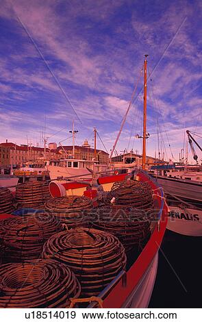 Moored fishing boats View Large Photo Image Stock Photo - Moored fishing boats. Fotosearch