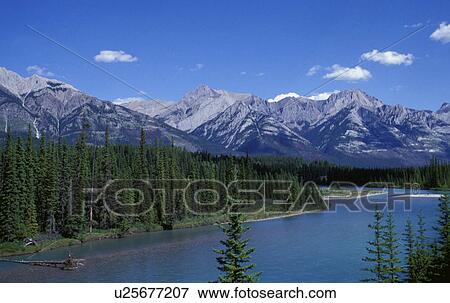 Stock Photo - Mountain range and lake. Fotosearch
