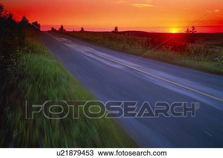 Moving at speed down country road View Large Photo Image Stock Image - Moving at speed down country road. Fotosearch
