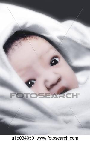 Newborn baby's expression View Large Photo Image Stock Photo - Newborn baby's expression. Fotosearch