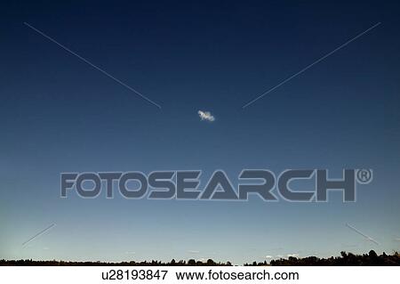 One small cloud in sky View Large Photo Image Stock Photo - One small cloud in sky. Fotosearch