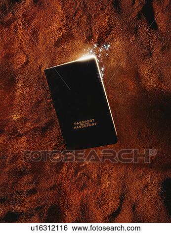 Passport with inner light on red background View Large Photo Image Stock Photograph - Passport with inner light on red background. Fotosearch