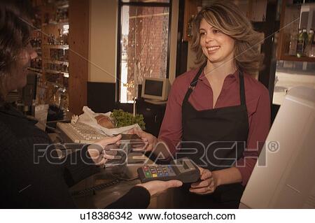 Payment for goods View Large Photo Image Stock Image - Payment for goods. Fotosearch