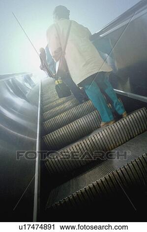 People on escalator View Large Photo Image Stock Image - People on escalator. Fotosearch