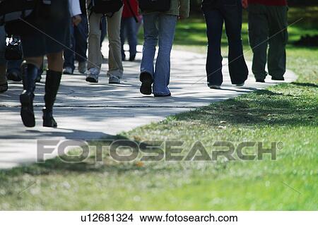 People walking on path View Large Photo Image Picture - People walking on path. Fotosearch
