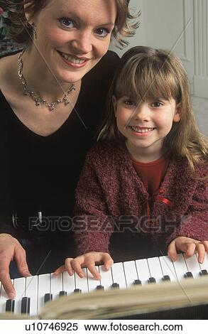 Stock Photography - Piano lessons. Fotosearch