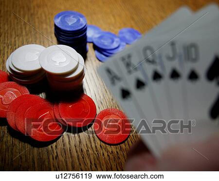 Playing poker with a full house hand View Large Photo Image Stock Photo - Playing poker with a full house hand. Fotosearch