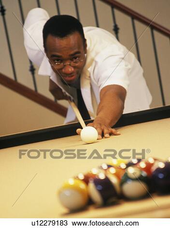 Pool shot in action View Large Photo Image Stock Image - Pool shot in action. Fotosearch