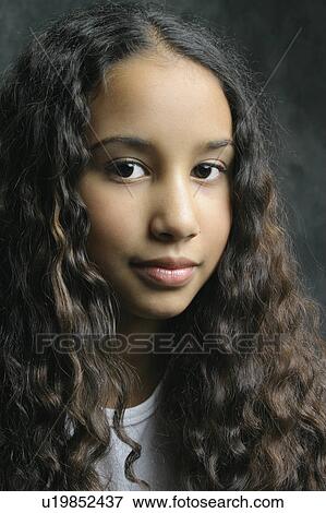 Stock Photo - Portrait of a girl. Fotosearch