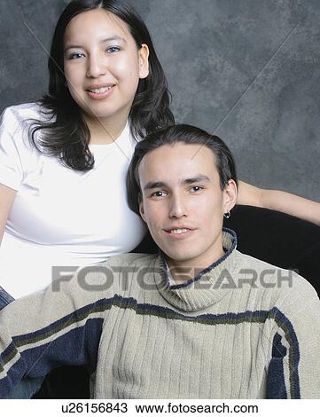 Portrait of a young adult couple View Large Photo Image Stock Image - Portrait of a young adult couple. Fotosearch