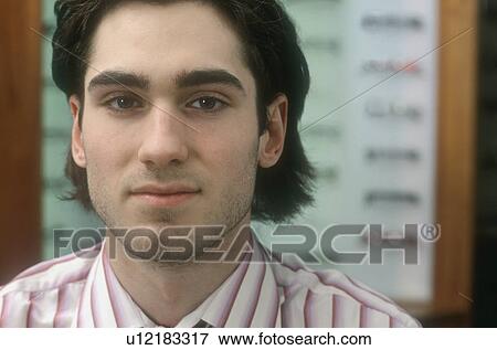 Portrait of a young man View Large Photo Image Stock Photo - Portrait of a young man. Fotosearch