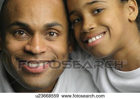 Stock Photo - Portrait of father and child. Fotosearch