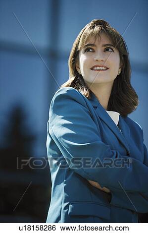 Stock Photograph - Portrait of smiling businesswoman. Fotosearch