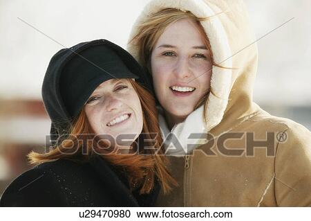 Stock Image - Portrait of teen girls outside. Fotosearch