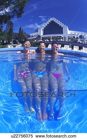 Portrait of three women in swimming pool View Large Photo Image Stock Photography - Portrait of three women in swimming pool. Fotosearch