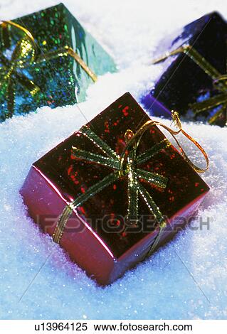 Stock Photography - Presents in snow. Fotosearch