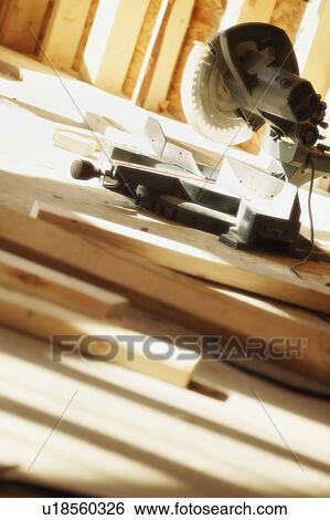 Radial Arm Saw in building under construction View Large Photo Image Stock Photograph - Radial Arm Saw in building under construction. Fotosearch