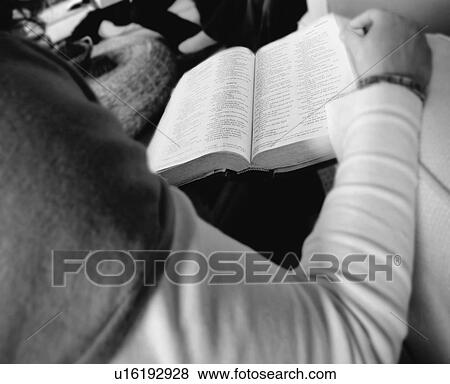 Reading the Bible View Large Photo Image Stock Photo - Reading the Bible. Fotosearch