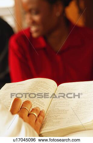 Reading the Bible View Large Photo Image Stock Photograph - Reading the Bible. Fotosearch