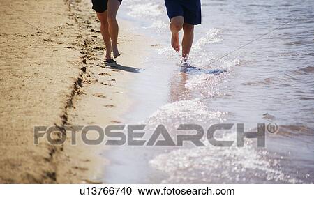 Running on the beach View Large Photo Image Stock Image - Running on the beach. Fotosearch