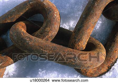 Rusted heavy chain link on snow View Large Photo Image Picture - Rusted heavy chain link on snow. Fotosearch