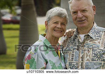 Senior couple looking at camera View Large Photo Image Stock Photography - Senior couple looking at camera. Fotosearch