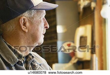 Stock Photo - Senior with hat. Fotosearch