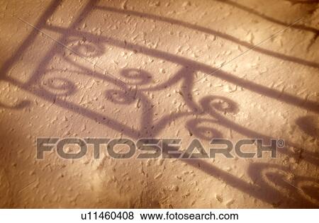 Shadow of a fence View Large Photo Image Stock Photo - Shadow of a fence. Fotosearch