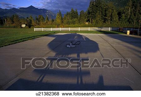 Stock Photo - Shadow of helicopter. Fotosearch