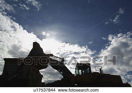 Silhouette of front-end loader View Large Photo Image Picture - Silhouette of front-end loader. Fotosearch