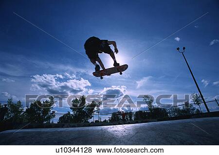 Skateboarder at skate park View Large Photo Image Stock Photo - Skateboarder at skate park. Fotosearch