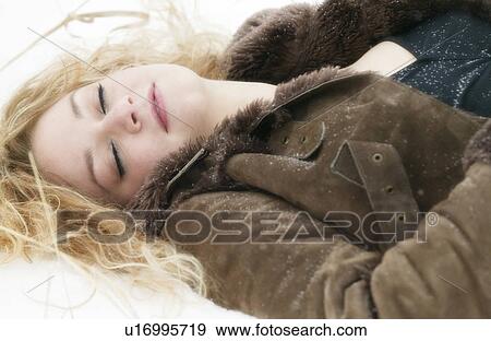 Sleeping woman in snow View Large Photo Image Stock Photo - Sleeping woman in snow. Fotosearch