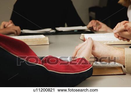 Small group prayer View Large Photo Image Stock Image - Small group prayer. Fotosearch