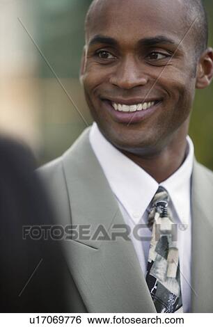 Smiling businessman View Large Photo Image Stock Photograph - Smiling businessman. Fotosearch