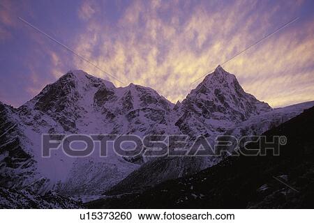 Snowy mountain in shadow View Large Photo Image Stock Image - Snowy mountain in shadow. Fotosearch