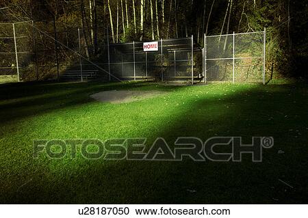 Stock Image - Sports ground at night. Fotosearch