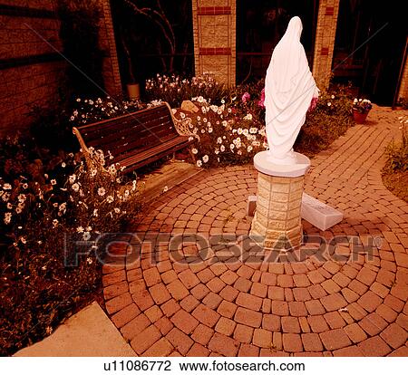 Statue of Mother Mary in garden View Large Photo Image Stock Image - Statue of Mother Mary in garden. Fotosearch