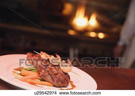 Steak and shrimp meal View Large Photo Image Picture - Steak and shrimp meal. Fotosearch