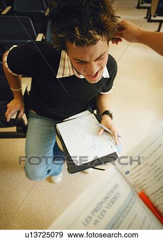 Student is disciplined for bad behavior View Large Photo Image Stock Photo - Student is disciplined for bad behavior. Fotosearch