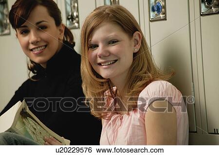 Stock Photograph - Students at their lockers. Fotosearch