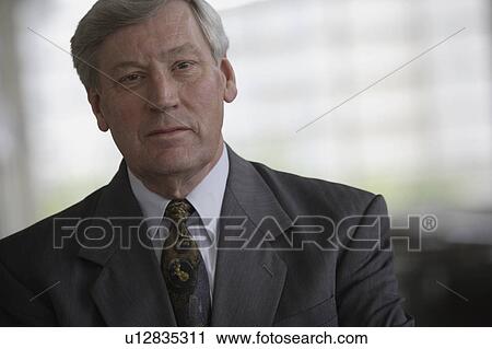 Suave senior businessman View Large Photo Image Stock Image - Suave senior businessman. Fotosearch