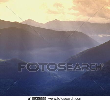 Sunlight on mountains View Large Photo Image Stock Photography - Sunlight on mountains. Fotosearch