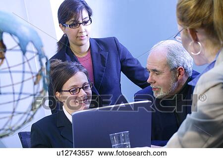 Team meeting View Large Photo Image Stock Photo - Team meeting. Fotosearch