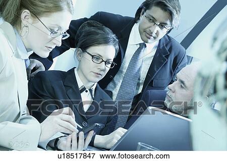 Team of Professionals consulting View Large Photo Image Stock Photo - Team of Professionals consulting. Fotosearch