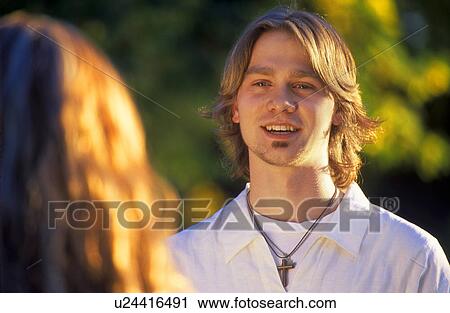 Teen boy facing girl View Large Photo Image Stock Image - Teen boy facing girl. Fotosearch