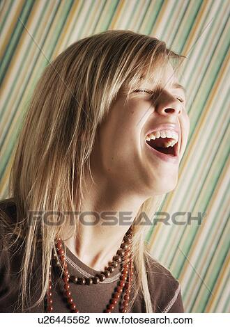 Stock Image - Teen laughing. Fotosearch