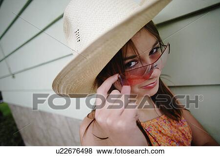 Teen with hat and sunglasses View Large Photo Image Stock Photo - Teen with hat and sunglasses. Fotosearch